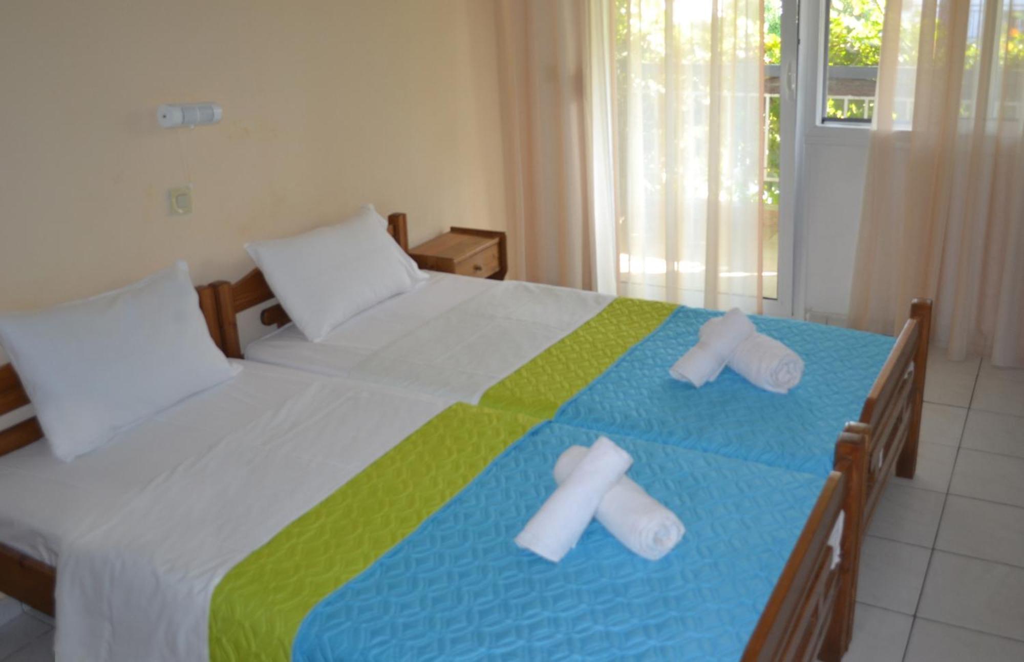 Artemis Apartments Паралия-Дионисиу Номер фото
