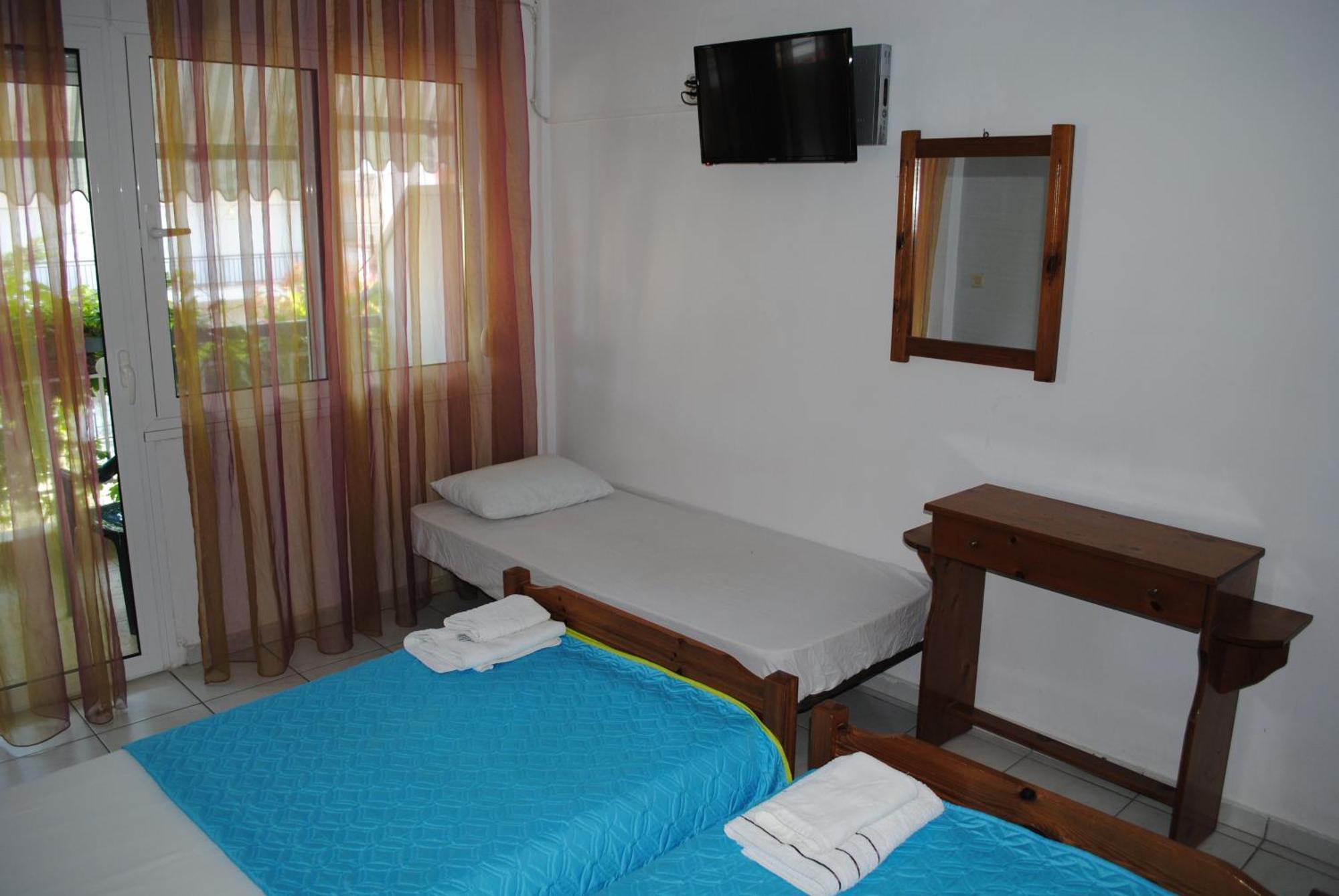 Artemis Apartments Паралия-Дионисиу Номер фото